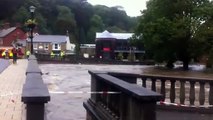 Downpours cause flooding in the UK