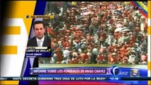 Ferétro de Hugo Chávez pasea por las calles de Venezuela entre llantos y oraciones