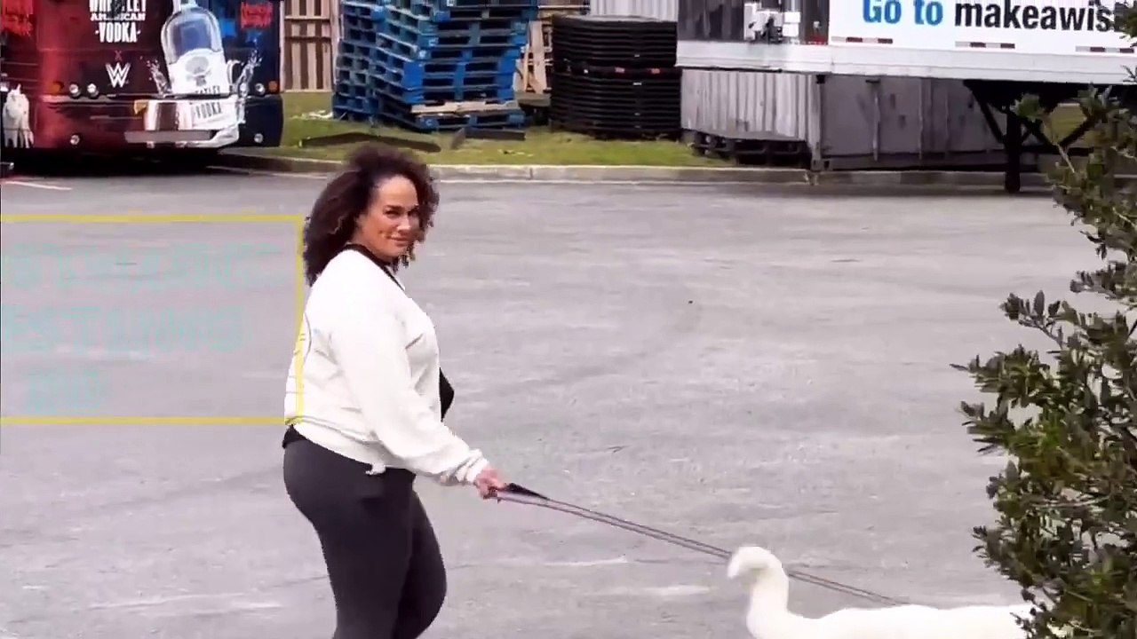 Nia jax walking Cody Rhodes dog Pharoah at WWE Road to Wrestlemania Supershow