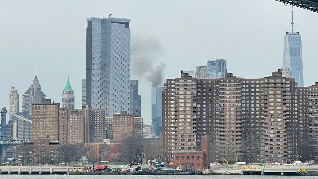 Smoke billows from building as Manhattan skyscraper catches fire