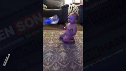 Pet şişeyi tek seferde dik atan ufaklığın tepkisi