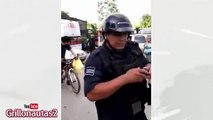 Policías tabasqueños intentan detener a migrante por supuestamente 
