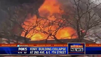 Скачать видео: Video - Burning Building Collapses After Massive Fire, Explosion in Manhattan