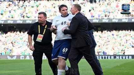 Download Video: England's pre-match line-up is GATECRASHED by a pitch invader in a replica kit in worrying security breach