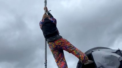 Camper balances tent on a 20-foot pole to create an epic camp flag