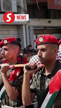 Palestinians hold memorial procession in honour of killed American-Turkish activist