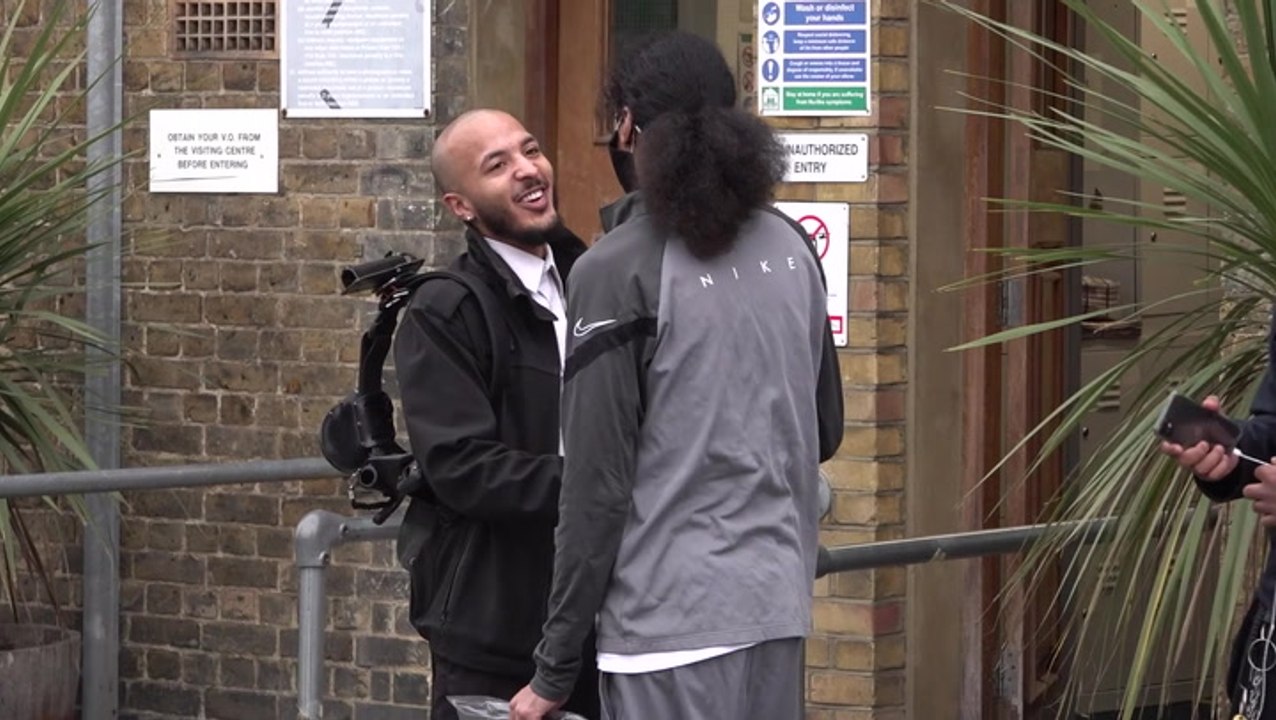 Moment prisoners leave jail after being freed early to cut overcrowding