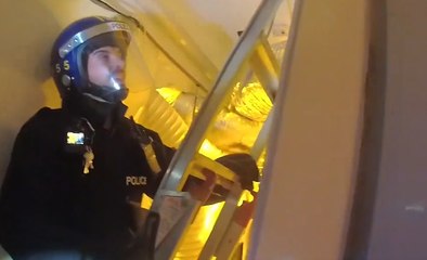 Bizarre moment cannabis grower hides in loft and pelts cops with soil