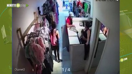 pareja robo tienda de ropa en Belen