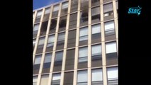 Un gato salta desde un quinto piso de un edificio en llamas
