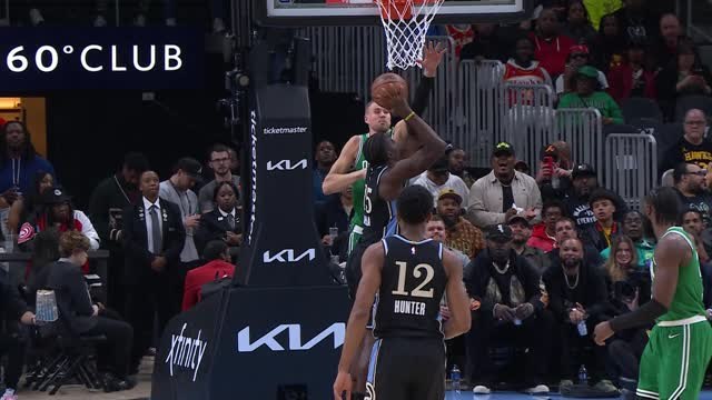 Clint Capela brushes aside Porzingis for slam