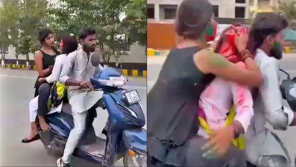 Télécharger la video: Viral Holi Video: होली पर लड़कियों को स्टंट करना पड़ा भारी, Noida Traffic Police ने सिखाया सबक!