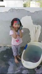 Akshu Trishu celebrating holi 2024