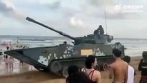 China fills shores of rebel island with military tanks