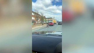 Video shows man towing metal fence from mobility scooter