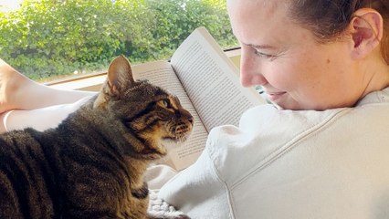 Senior Cat Turned Into A Literal Infant When She Got Adopted