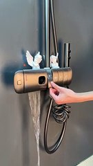 The shower's sleek fixtures and high-quality materials add a touch of luxury