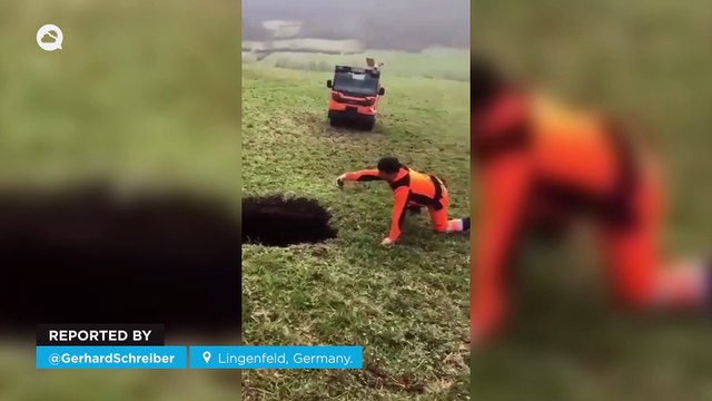 A deep hole suddenly appears in a field in Lingenfeld, Germany