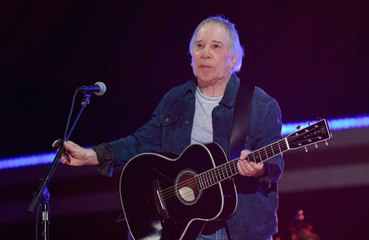 Paul Simon was "exhausted" by his marriage to Carrie Fisher