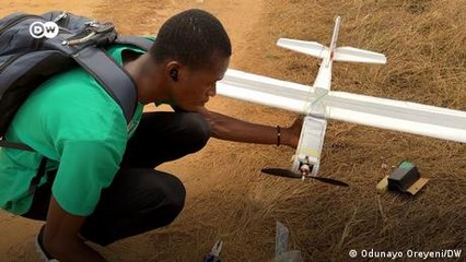 Young Nigerian turns trash into model airplanes