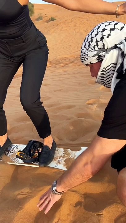 Sandboarding in desert safari Dubai