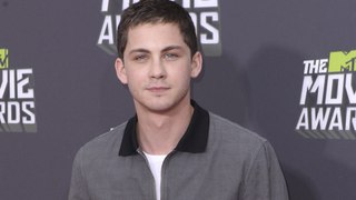 Logan Lerman proposed to longtime love Analuisa Corrigan after Central Park row boat embarrassment: 'I was terrible at it'