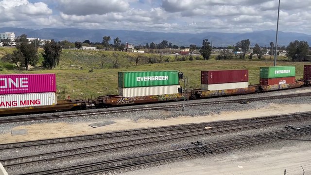 UP 5441 Leads Eastbound Autorack and Stack Train Passes Through West Colton Yard