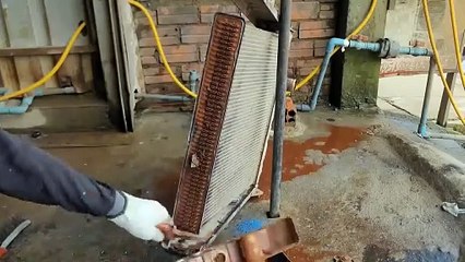 Clean the car radiator or supporting parts of the radiator
