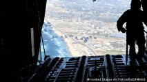 Israel-Hamas war: Onboard an aid airdrop mission in Gaza