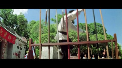 Jackie Chan fights with the Bamboo King in the movie DRUNK MASTER (1978)