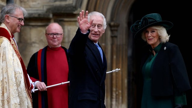 King Charles waves to crowds as he arrives for Easter Sunday church service in Windsor