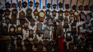 Owners of worlds biggest cuckoo clock collection spend 3 days moving 750 timepieces forward one hour - by hand