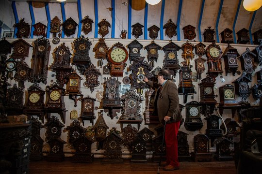 Owners of worlds biggest cuckoo clock collection spend 3 days moving 750 timepieces forward one hour - by hand
