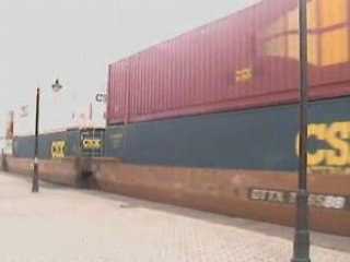 UP Stack Train Passing Station and work crews