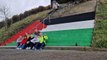 Colours of the flag of Palestine painted on Foyle Bridge steps by solidarity campaigners in Derry