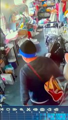 CCTV shows 'theft of stereo from charity shop'