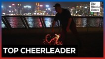 Ex-rugby player uses light painting to cheer for HK team