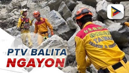 Taiwan rescuers free nine from cave after quake