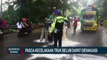 Polisi Kesulitan Evakuasi Truk Pengangkut Minyak yang Terguling di Jalur Mudik Arteri Cipatat