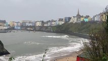 Watch surfers trying to catch a wave in Tenby during Storm Kathleen