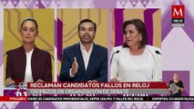 Candidatos molestos por falla en el reloj durante el primer debate presidencial