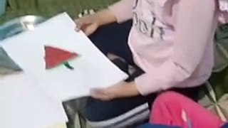 Akshu and Trishu creating drawing of watermelon