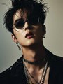 A handsome Korean male star wearing sunglasses, cool, jewelry,Midjourney prompts