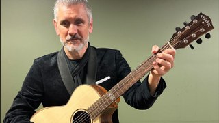 Curtis Stigers's delight when gifted a Titanic Guitar