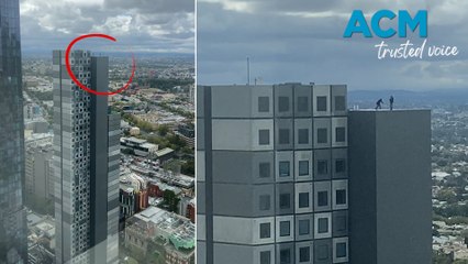 Skateboarder's extreme stunts on 47-story building filmed by tense onlookers
