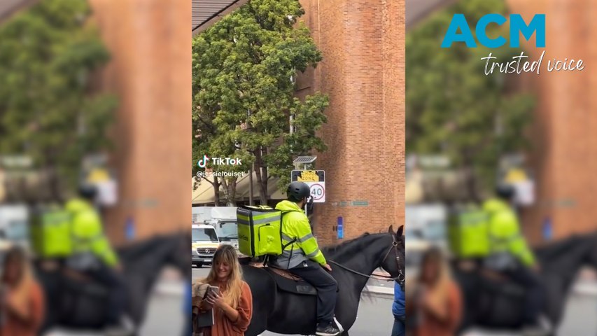 A man was filmed riding a horse through the streets of Paddington while making a food delivery.