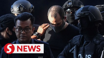 Israeli 'spy' claims trial to charges of possessing, trafficking firearms