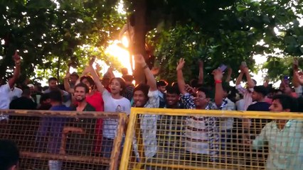 Download Video: Shah Rukh Khan greets fans outside Mannat with son AbRam on Eid Mubarak, actor drops video