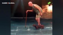 Yaşlı sahibinin yürüyüşüne ayak uyduran köpeğin merhameti izlenme rekoru kırdı