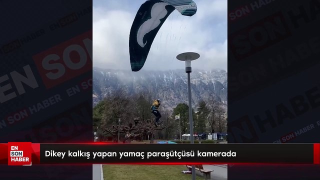 Dikey kalkış yapan yamaç paraşütçüsü kamerada